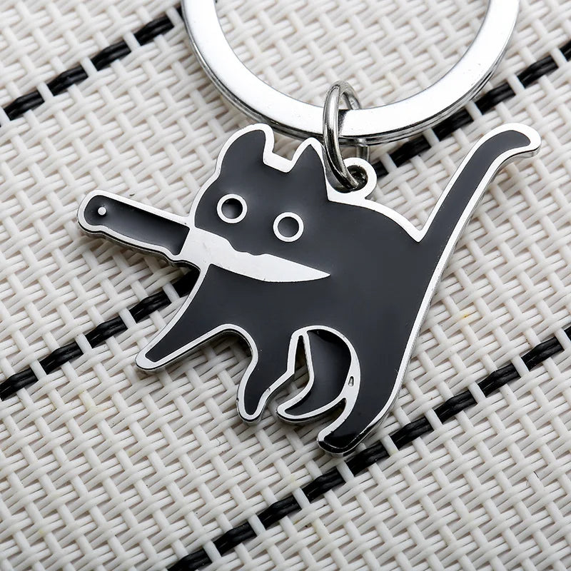 Portachiavi Cute Knife Cat in acciaio inox con un gattino nero che tiene un coltello, perfetto per borse e chiavi.