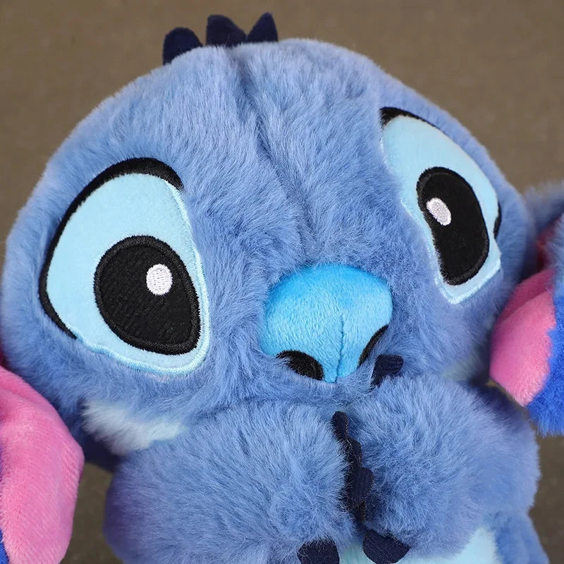 Peluche Stitch che respira con musica e luce soffusa per bambini.