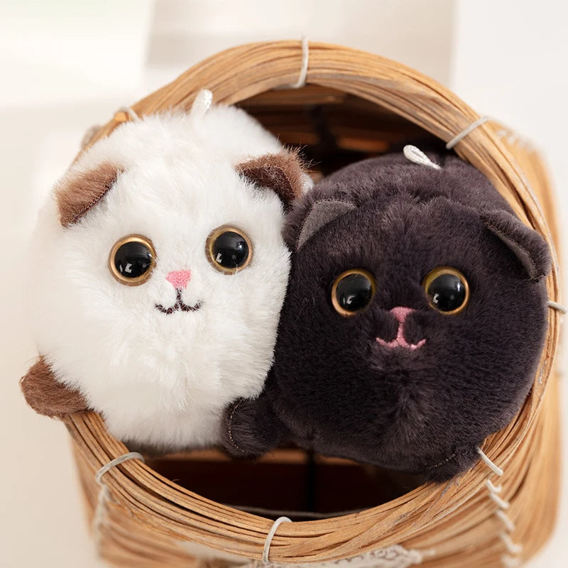 Portachiavi gattino con coda rotante in morbido peluche, perfetto per chiavi, borse e zaini. Un regalo adorabile per gli amanti dei gatti.