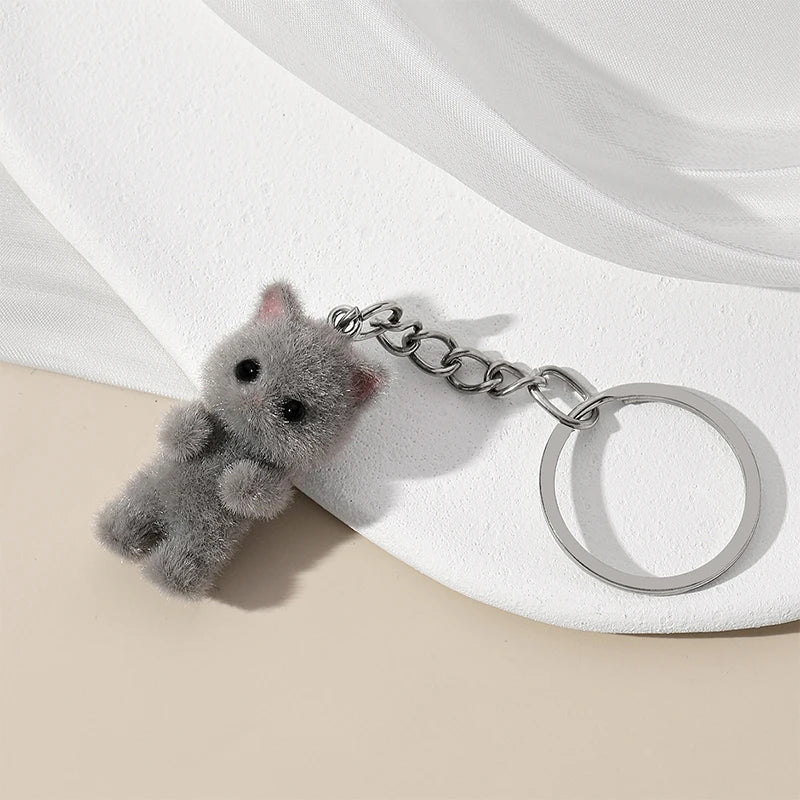 Adorabile set di tre portachiavi gatto soffici in grigio, bianco e rosa. Portachiavi gatto, regalo portachiavi, portachiavi kawaii, amanti dei gatti, charm per borsa, pendenti per telefono.