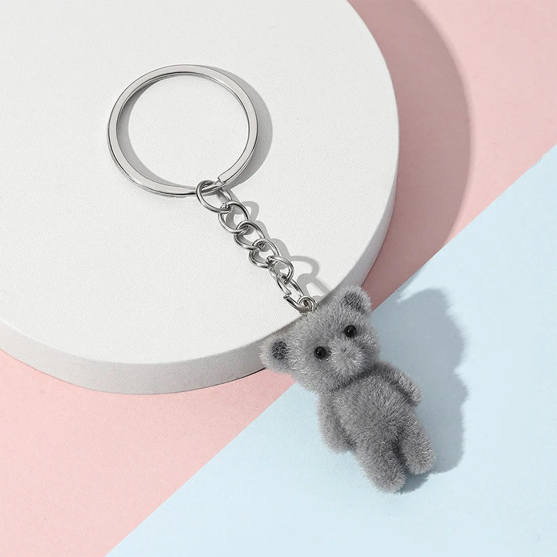 Adorabile set di tre portachiavi gatto soffici in grigio, bianco e rosa. Portachiavi gatto, regalo portachiavi, portachiavi kawaii, amanti dei gatti, charm per borsa, pendenti per telefono.