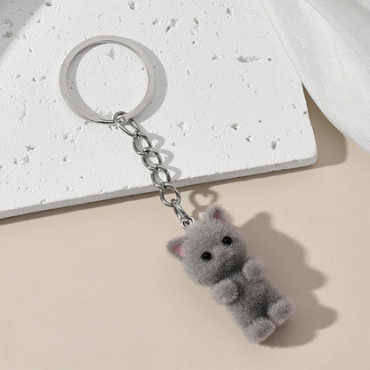 Adorabile set di tre portachiavi gatto soffici in grigio, bianco e rosa. Portachiavi gatto, regalo portachiavi, portachiavi kawaii, amanti dei gatti, charm per borsa, pendenti per telefono.