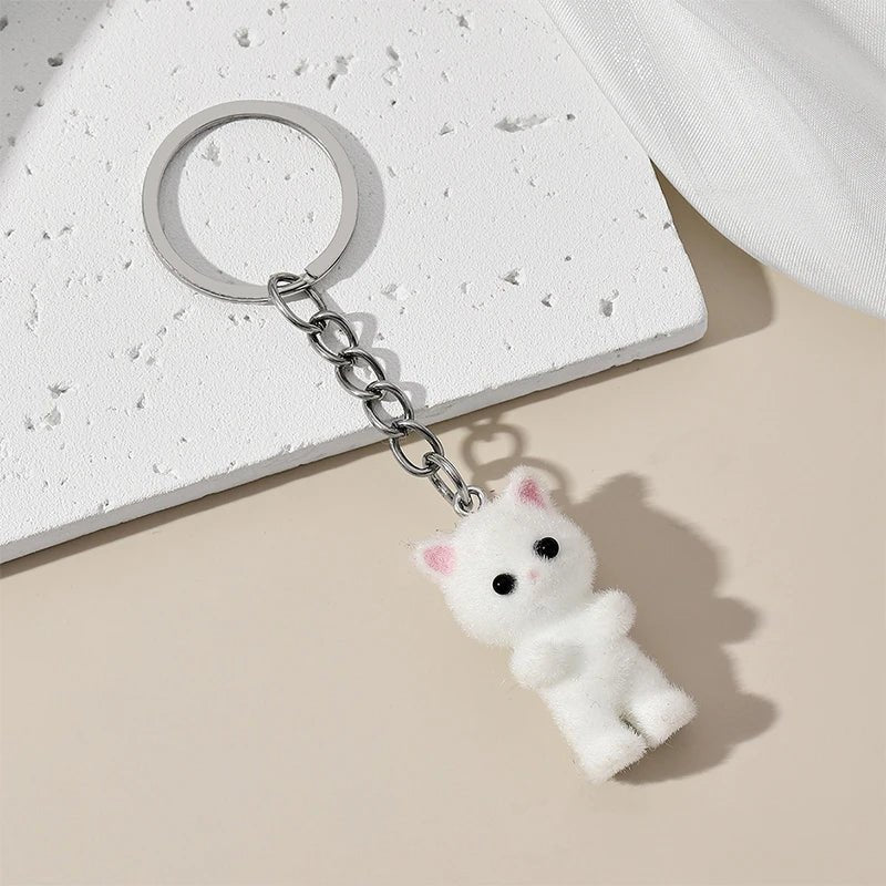 Adorabile set di tre portachiavi gatto soffici in grigio, bianco e rosa. Portachiavi gatto, regalo portachiavi, portachiavi kawaii, amanti dei gatti, charm per borsa, pendenti per telefono.