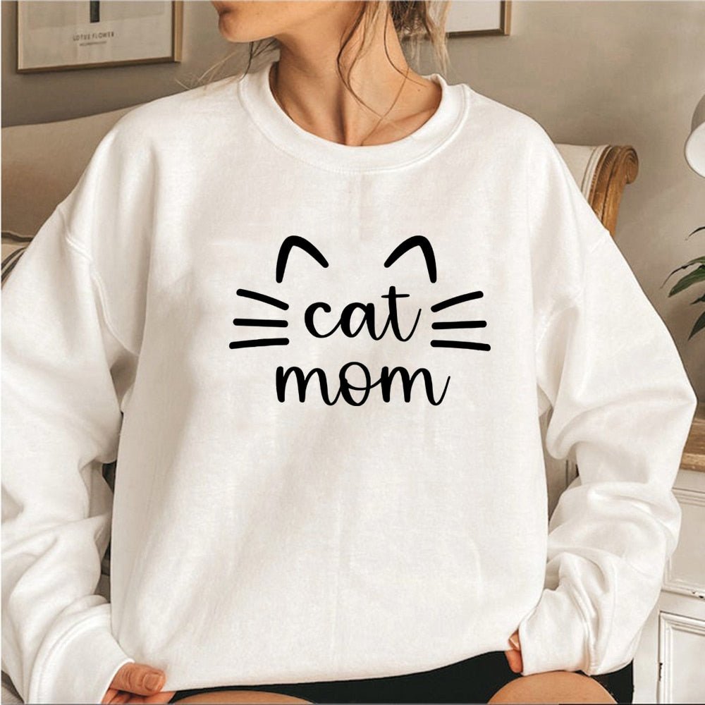 Felpa Cat Mom con orecchie e baffi, perfetta per le mamme gattare. Disponibile in rosa, grigio, beige, e altri colori. Felpa comoda per autunno e inverno.